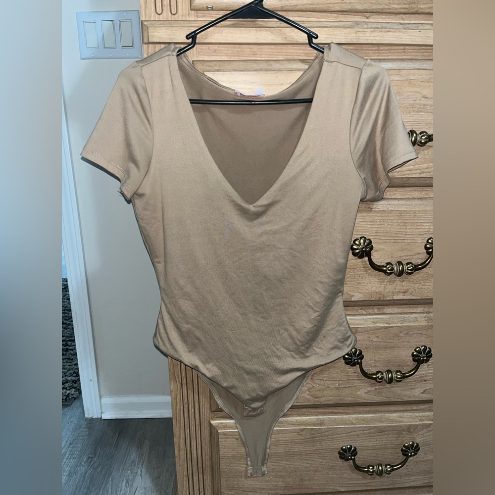 Pink Lily body suit